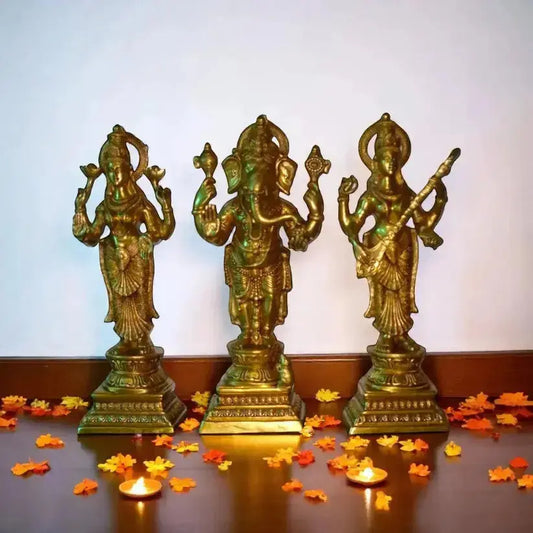 Brass Lakshmi, Ganesh, and Saraswati idols placed in a modern home setting, symbolizing peace, prosperity, and wisdom, with warm lighting and minimal décor enhancing a calm and spiritual ambiance.