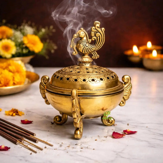 Calm study space with brass dhoop dani releasing soothing aromatic incense smoke