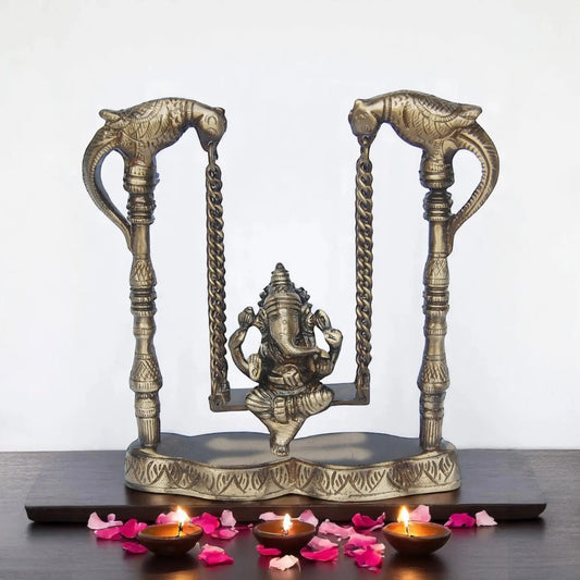 Handcrafted Brass Ganesha Sitting on Jhula | Brass Ganesha Showpiece for Home Decoration ( Yellow, 8 inch) Aakrati