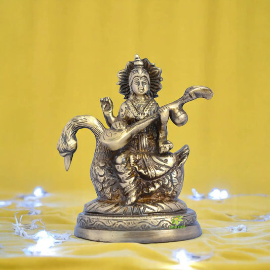 Brass Saraswati Murti Sitting on Swan | Divine Idol for Home Decor and Spiritual Blessings | Antique Saraswati Statues ( Brown, 5 inch) Aakrati