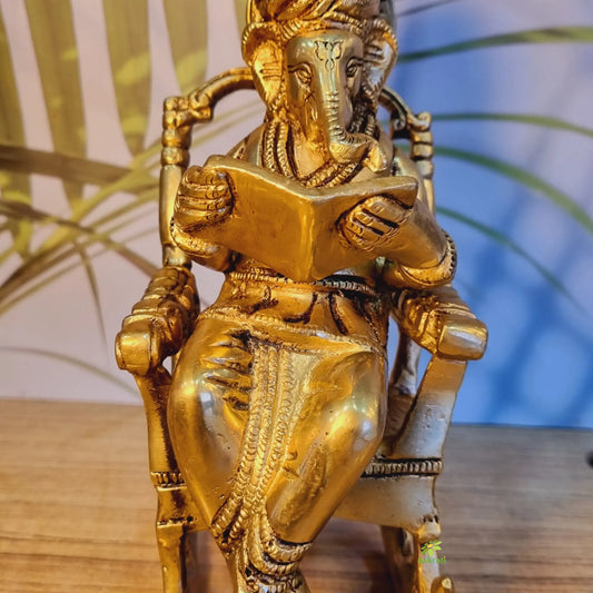 Handcrafted Brass Ganesha Idol | Sitting on Chair for Blessings & Prosperity | Elegant Brass Ganesha Murti ( Yellow, 7.5 inch) Aakrati