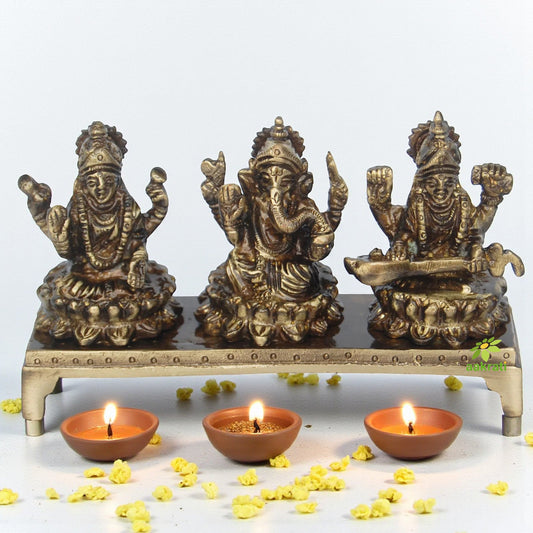 Brass Lakshmi, Ganesha & Saraswati on Chowki | Symbol of Prosperity, Wisdom & Blessings | Brass Religious Idol ( Brown, 5 inch) Aakrati