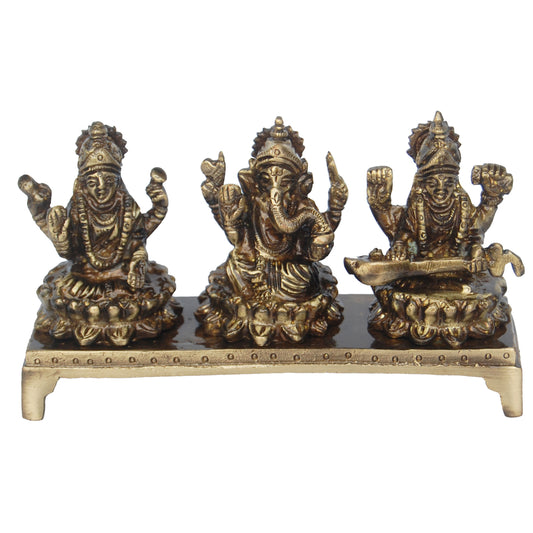 Brass Lakshmi, Ganesha & Saraswati on Chowki | Symbol of Prosperity, Wisdom & Blessings | Brass Religious Idol ( Brown, 5 inch)