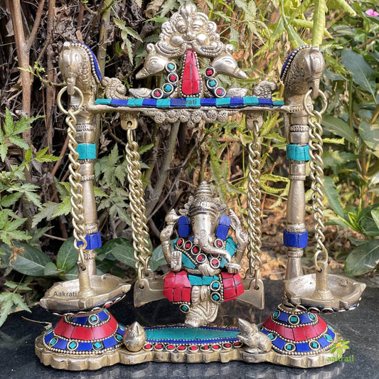 Turquoise work Brass Ganesha Swing with Oil Lamp with Peacock Design with stone work Aakrati