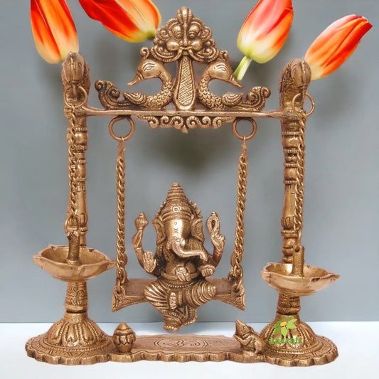 Brass Ganesha Swing with Oil Lamp with Peacock Design Aakrati