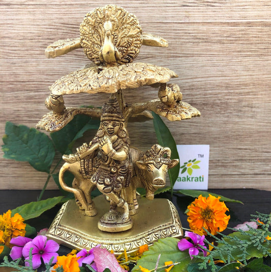 Elegant statue of Lord Krishna playing flute under tree with cow Decorative Showpiece Aakrati