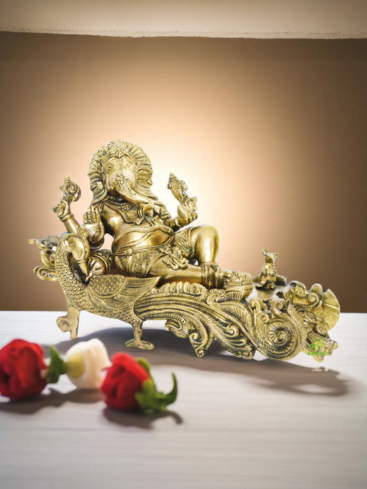 Lord Ganesha Sitting on Sofa Made of Brass Aakrati