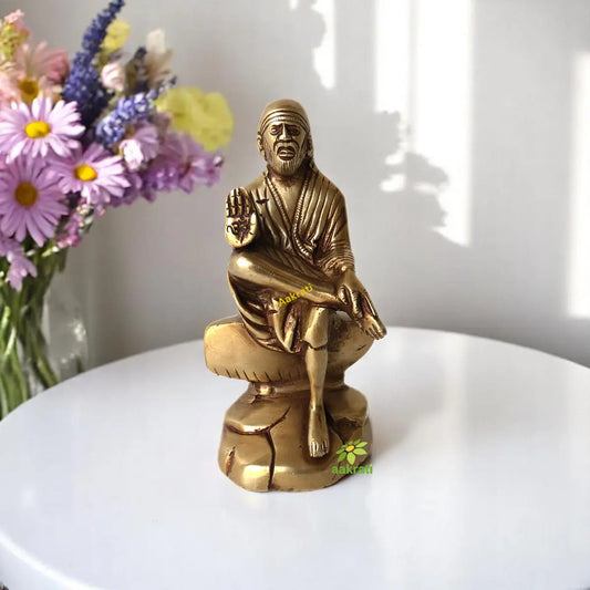Brass made Sai Baba of Shirdi sitting statue Aakrati