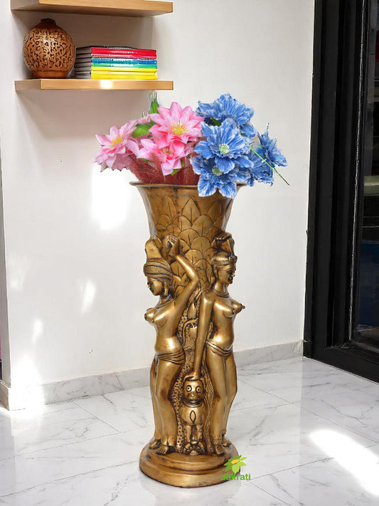 Flower pot with lady figures
