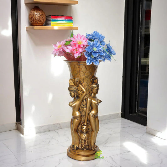 Flower pot with lady figures