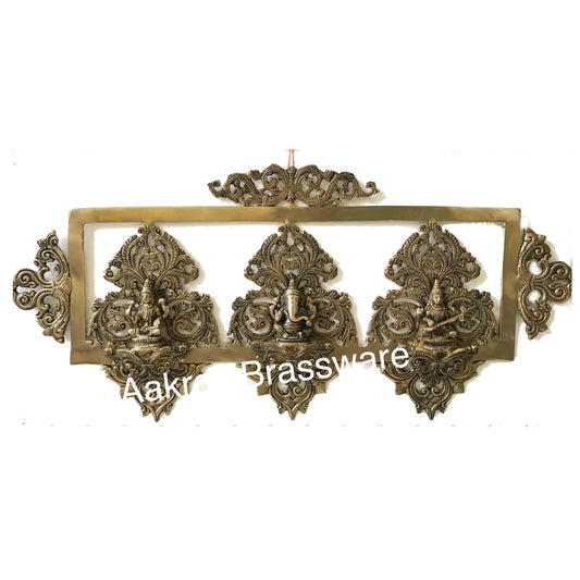 Brass made Laxmi Ganesha Saraswati decorative religious wall decor Aakrati