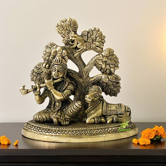 Lord Krishna Sitting under a tree playing flute with cow brass made decorative statue for gift/decor Aakrati