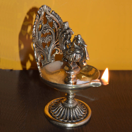 Brass Made Table Diya with Peacock Figure Aakrati
