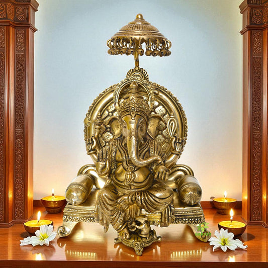 Lord Ganesha Sitting on a decorative throne brass made pooja ghar decoration statue Aakrati