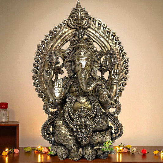 Large Ganesh with Aarch prabhawali made in brass metal with antique bronze finish