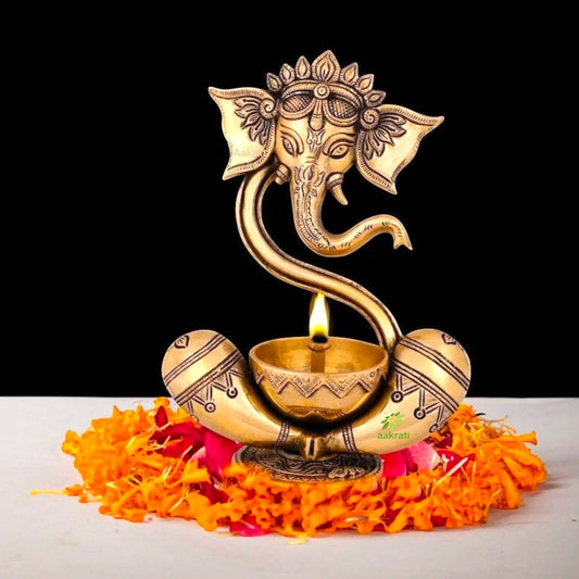 Ganesh statue with akhand diya table top religious hindu god figure Aakrati