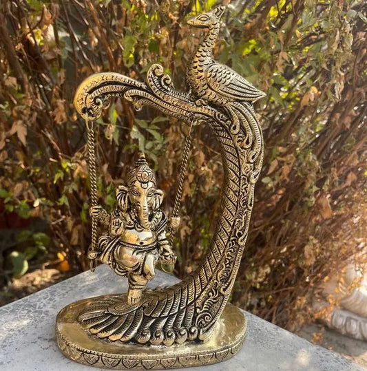 Swing Ganesh brass table showpiece sculpture for gift and decor Aakrati
