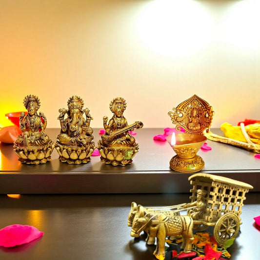 Premium Brass Combo – Lakshmi Ganesh Saraswati Statues, Brass Diya & Decorative Bullock Cart | Pooja Room & Festival Gift Aakrati