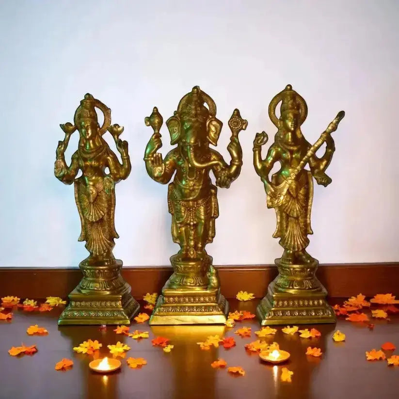 Brass Lakshmi, Ganesh, and Saraswati idols placed in a modern home setting, symbolizing peace, prosperity, and wisdom, with warm lighting and minimal décor enhancing a calm and spiritual ambiance.