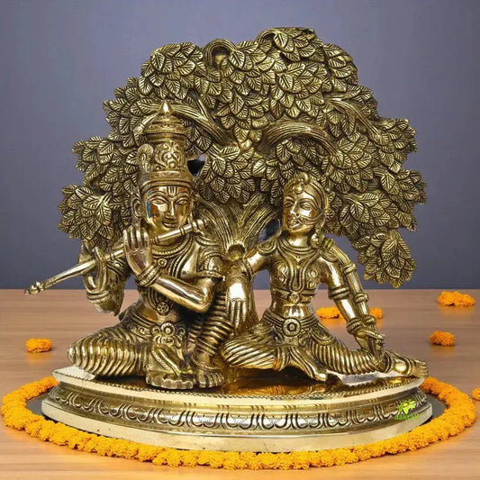 Traditional Indian brass Radha Krishna sculpture with tree design