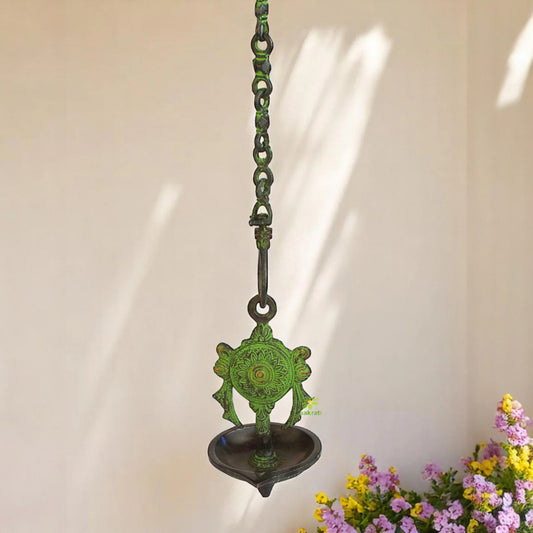Brass Chakra Oil Lamp | Elegant Spiritual Decor for Festivals and Celebrations | Handmade Brass Chakra Wall Hanging Diya ( Green, 5 inch)