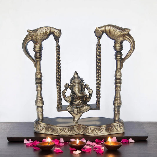 Handcrafted Brass Ganesha Sitting on Jhula | Brass Ganesha Showpiece for Home Decoration ( Yellow, 8 inch)