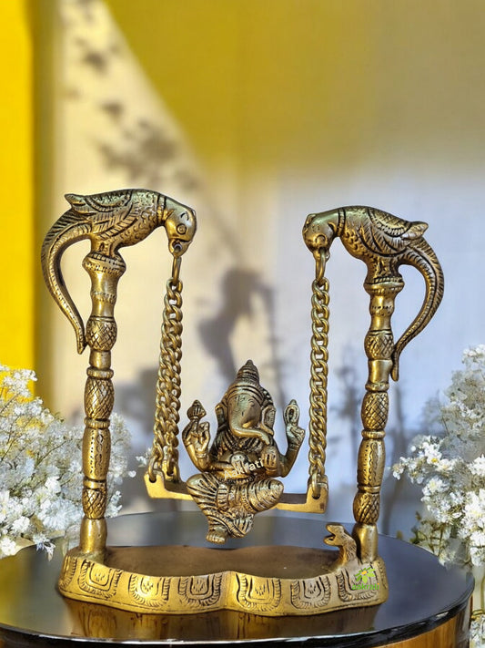 Brass Ganesha Idol on Swing | Perfect Home Decor for Prosperity and Peace | Handmade Decorative Ganesha Murti ( Yellow, 8 inch)