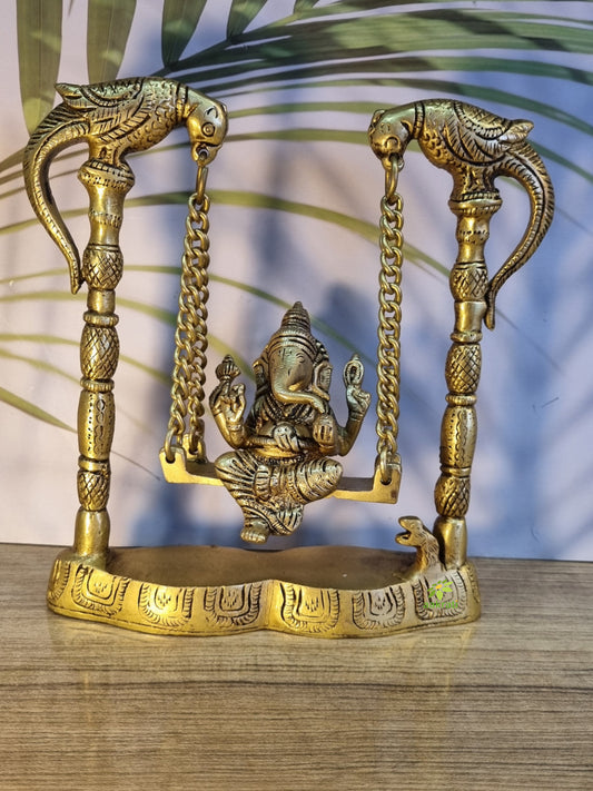 Brass Ganesha Idol on Swing | Perfect Home Decor for Prosperity and Peace | Handmade Decorative Ganesha Murti ( Yellow, 8 inch)