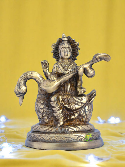 Brass Saraswati Murti Sitting on Swan | Divine Idol for Home Decor and Spiritual Blessings | Antique Saraswati Statues ( Brown, 5 inch)