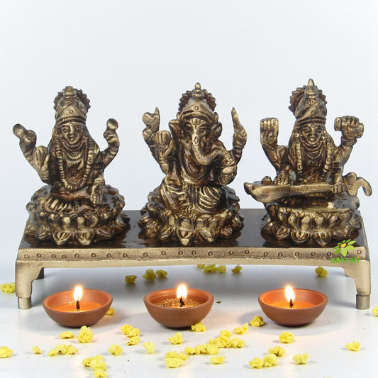 Brass Lakshmi, Ganesha & Saraswati on Chowki | Symbol of Prosperity, Wisdom & Blessings | Brass Religious Idol ( Brown, 5 inch)