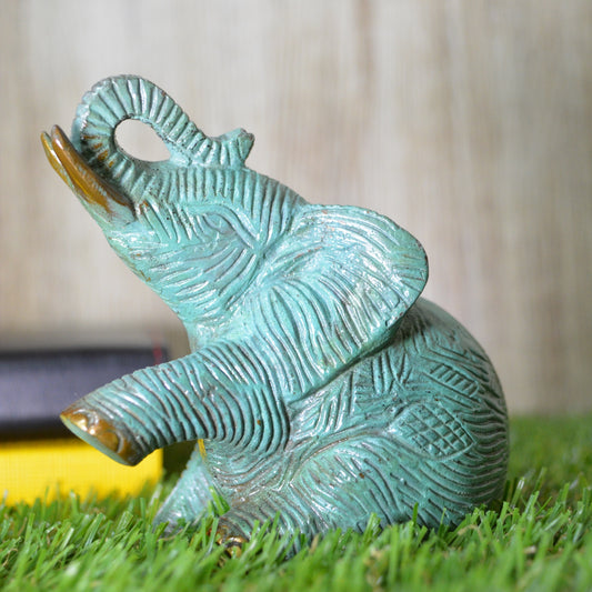 Aakrati Metal Handicrafts Sitting Brass Elephant Showpiece with green patina