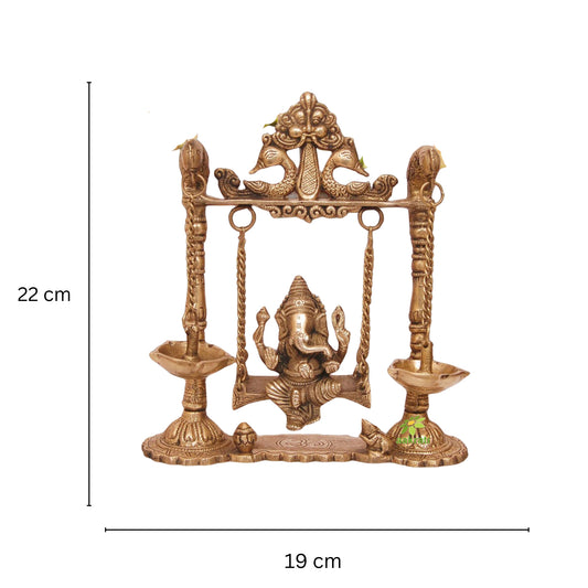 Brass Ganesha Swing with Oil Lamp with Peacock Design