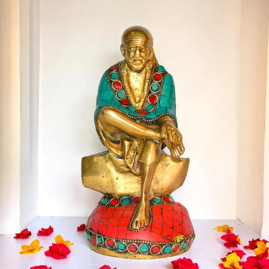 Sitting Sai Baba statue with turquoise coral stone work
