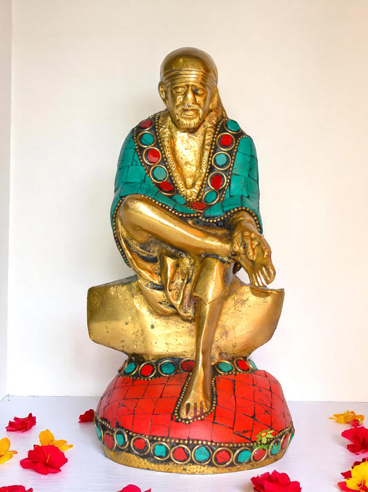 Sitting Sai Baba statue with turquoise coral stone work