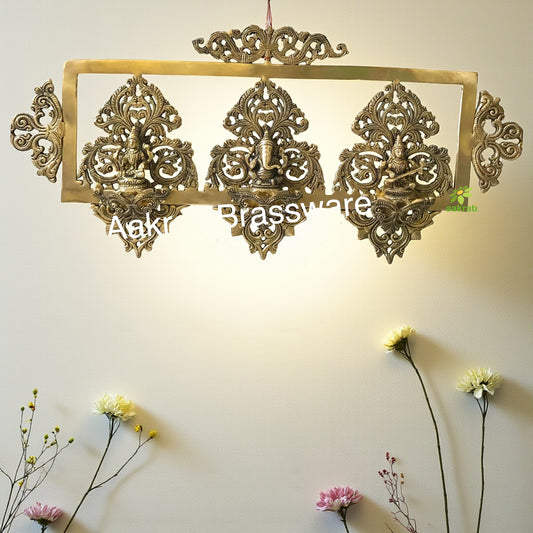 Brass made Laxmi Ganesha Saraswati decorative religious wall decor