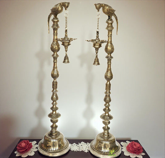 Brass made Parrot figure holding oil lamp with bells for puja ghar/living room decoration