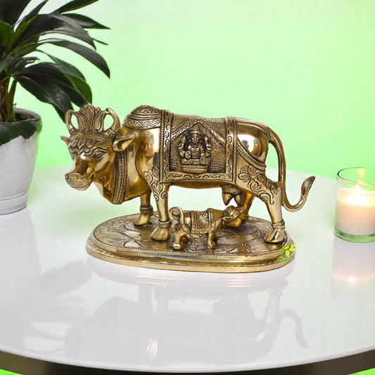 Aakrati Yellow Colour 6 inch Cow with Calf and Laxmi Ganesh Carved Showpiece Figurine
