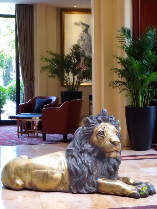 Lion Sculpture sitting hotel lobby decor resorts garden