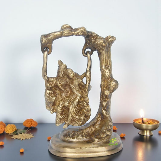 Brass Radha Krishna on Jhula | Bring the Blessings of Love & Peace | Luxury Brass Radha Krishna Statue on Swing ( Yellow, 7 inch)