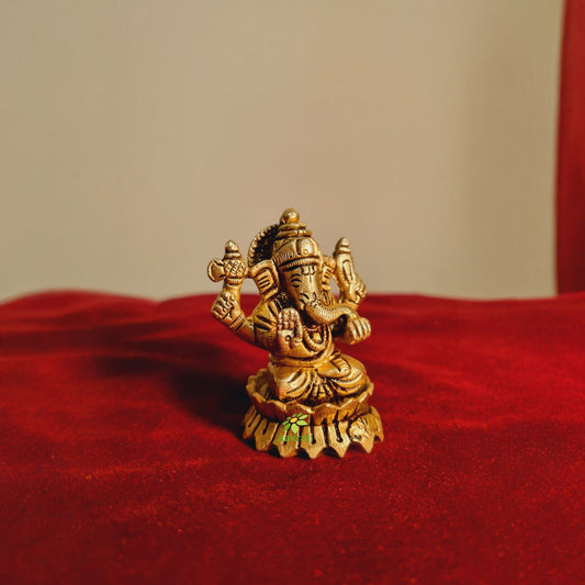 Aakrati Brass Ganesh Statue in Sitting Position| Ganesh Idol| Temple Decor (Yellow, 2.5 inch)