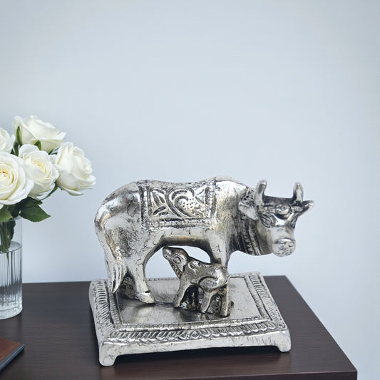 Cow and calf silver finish statue