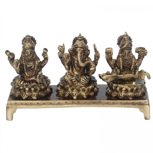 Brass Lakshmi, Ganesha & Saraswati on Chowki |  Symbol of Prosperity, Wisdom & Blessings | Brass Religious Idol ( Brown, 5 inch)