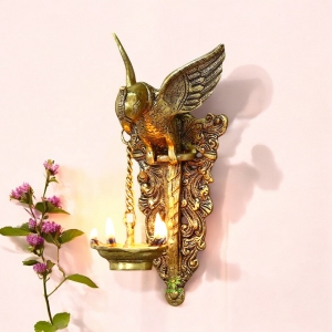 Brass made bird holding oil lamp wall diya/wall decor