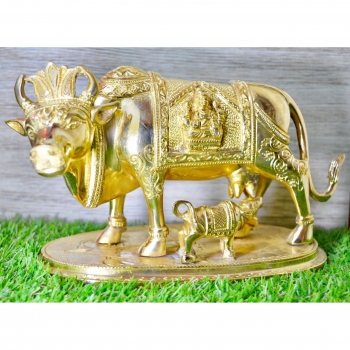 Aakrati Yellow Colour 6 inch Cow with Calf and Laxmi Ganesh Carved Showpiece Figurine